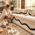 Scalloped chenille sofa cover styled in a warm everyday living room