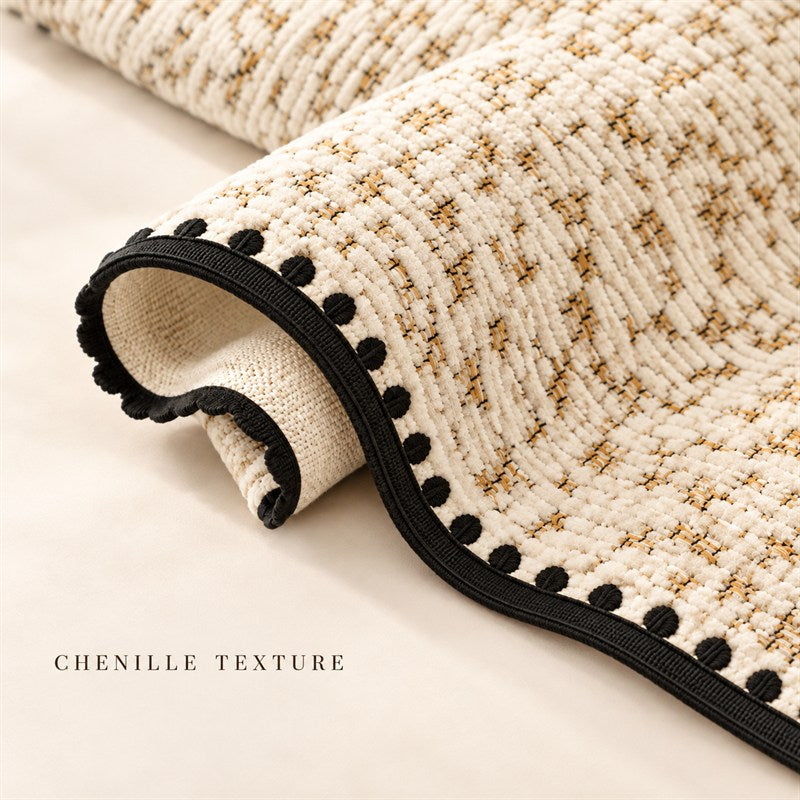 Close-up of the chenille sofa cover texture and decorative edge